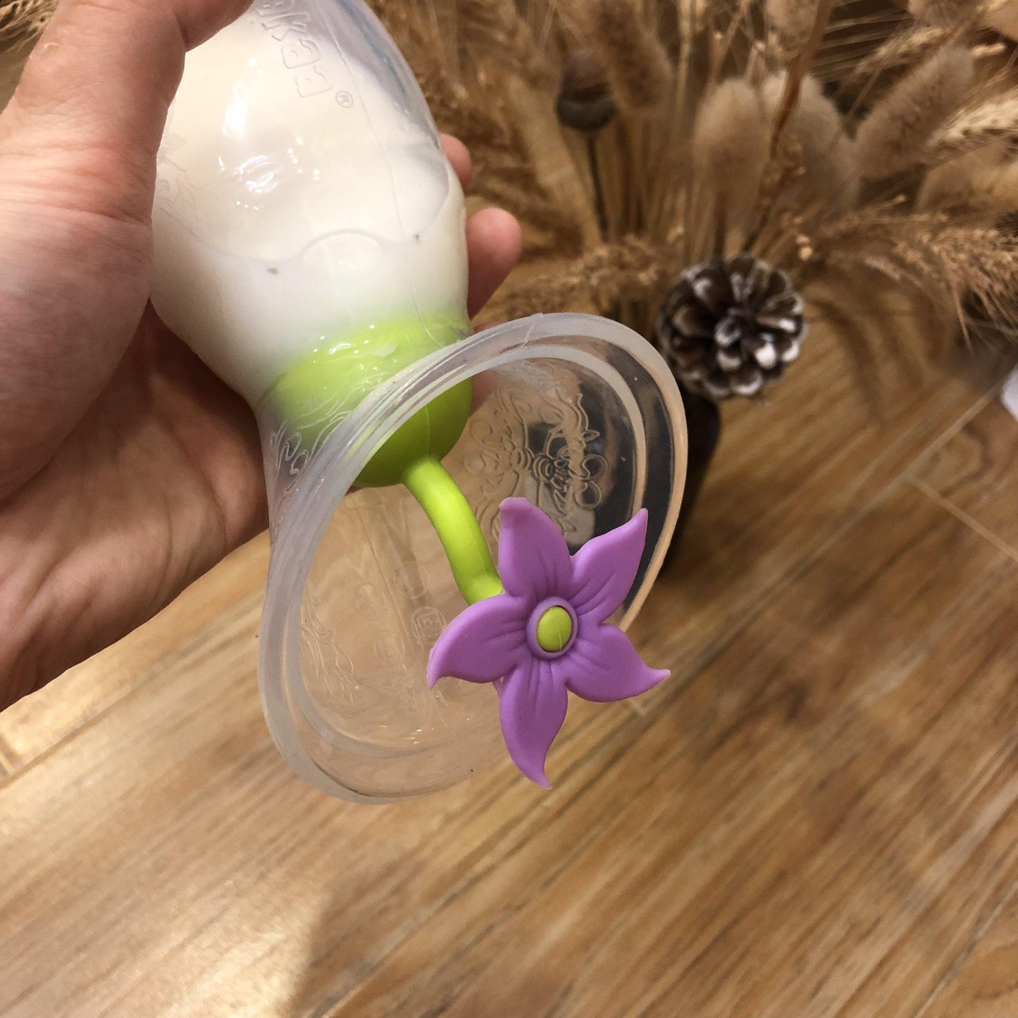 Tapón de flor para recolector de leche